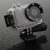sports action camera in case with water on it